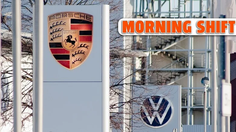 Billboards with the Porsche VW logo on the street near the auto center.